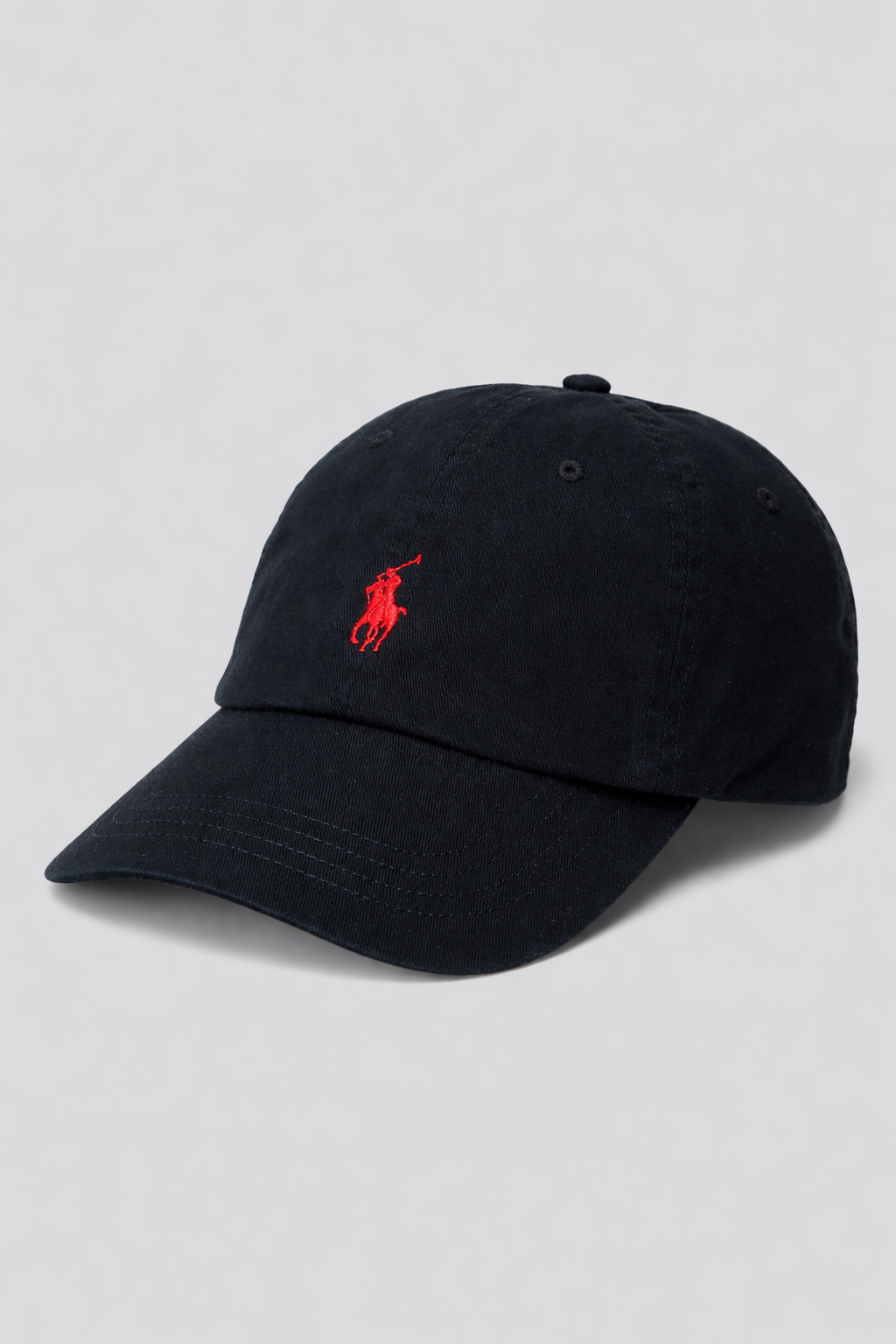 Black cap with a red logo on a light gray background